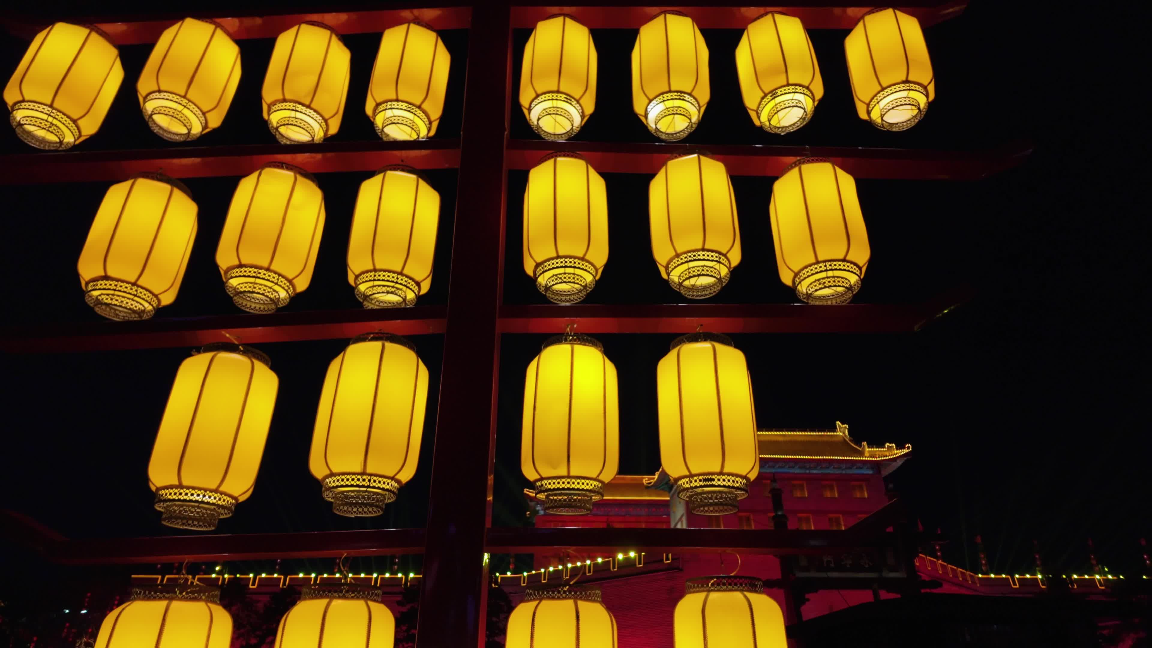 Classical Chinese lanterns are lit up at night