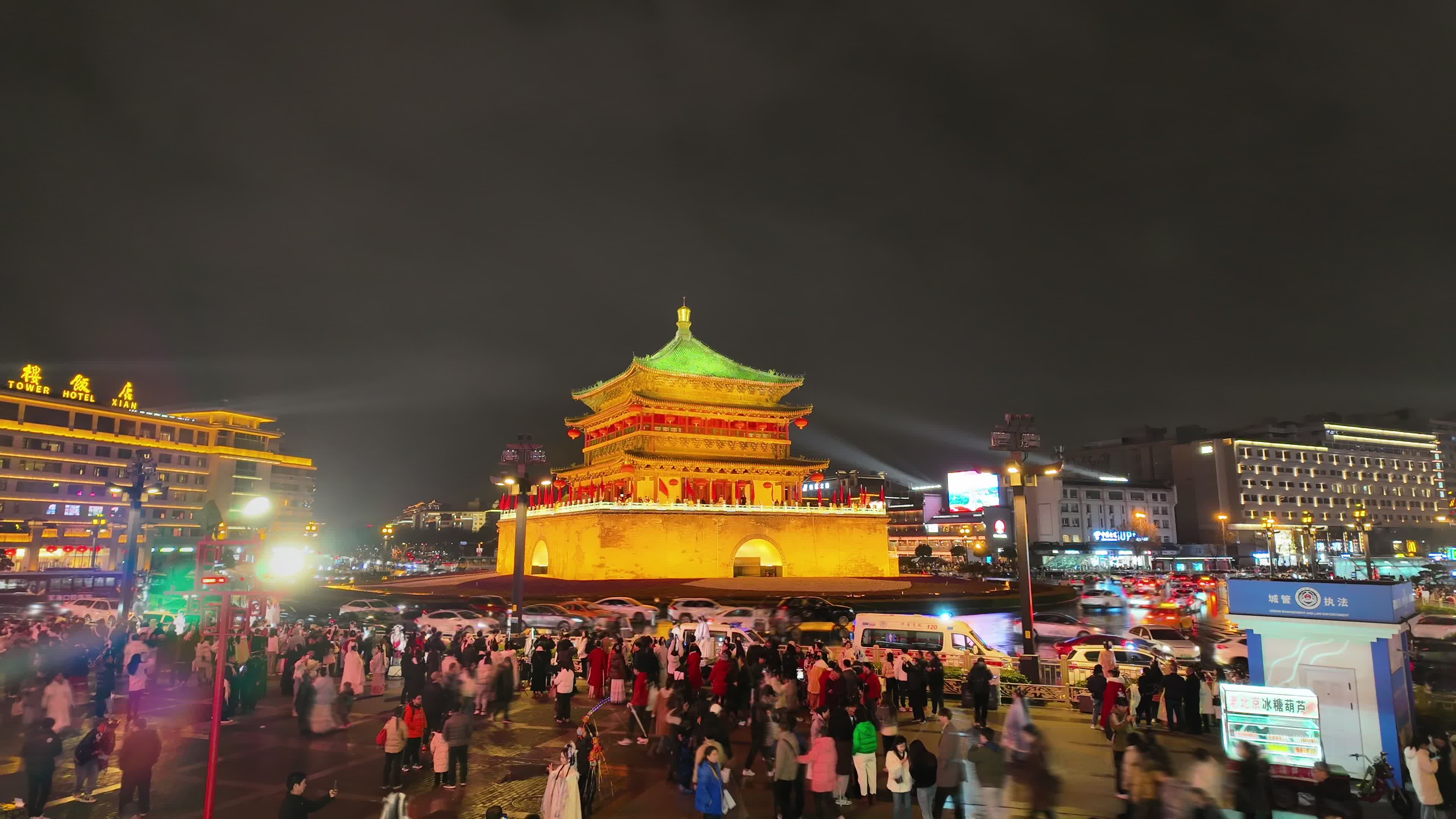 Xi 'an clock Tower at night bright lights, time-lapse video